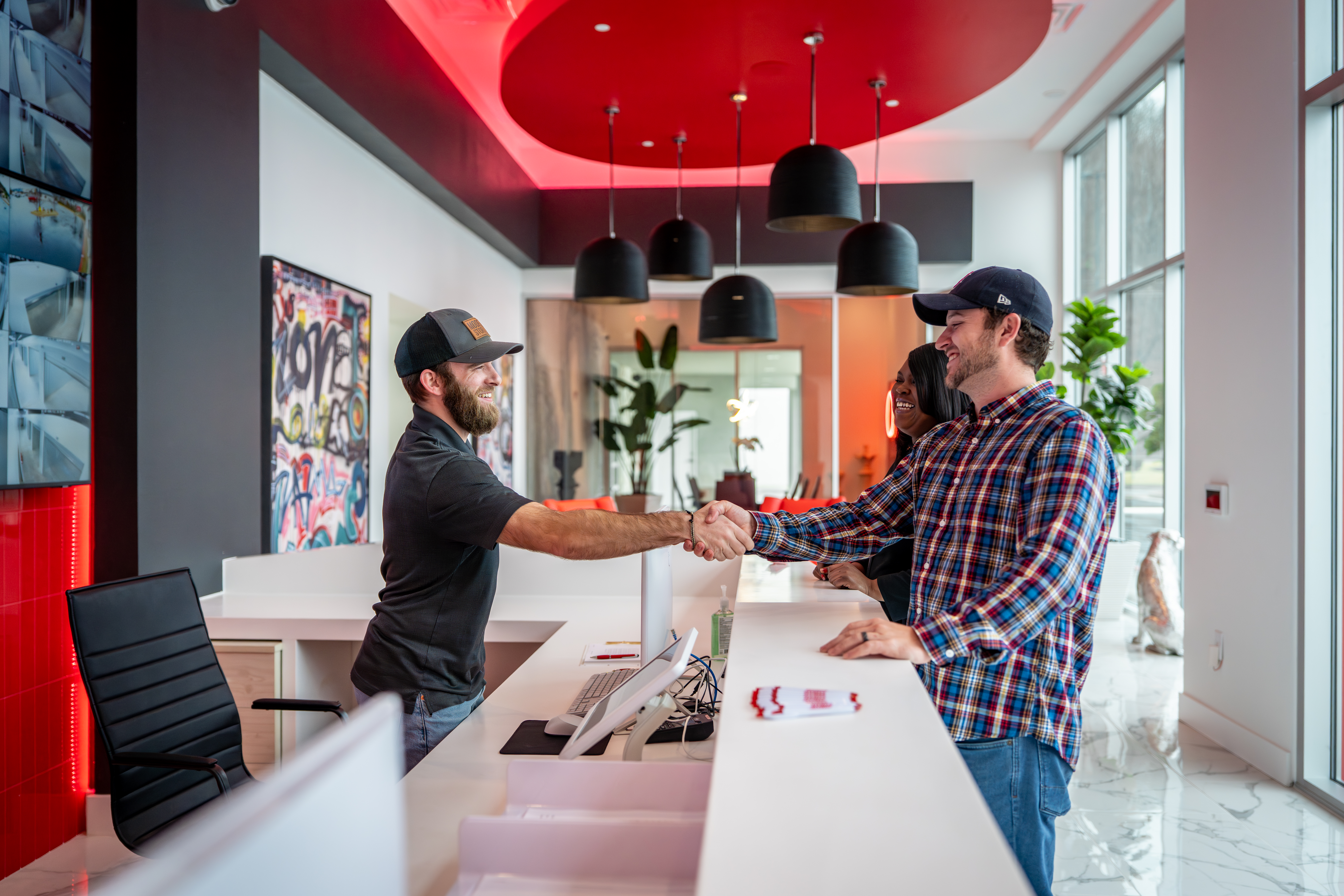 Modern Storage® manager assisting customers at a Modern Storage® self storage facility